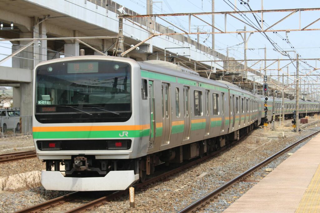 A JR train arriving at a railway station in Tochigi Prefecture, Japan.